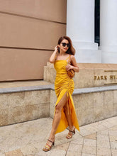 Silk ruched slip dress with adjustable side slit and spaghetti straps for elegant evenings